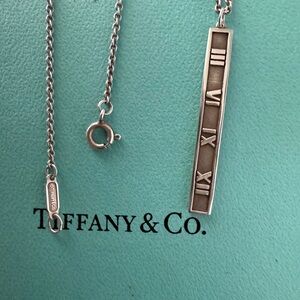Tiffany & Co. Silver Atlas Roman Numeral Pendant Necklace